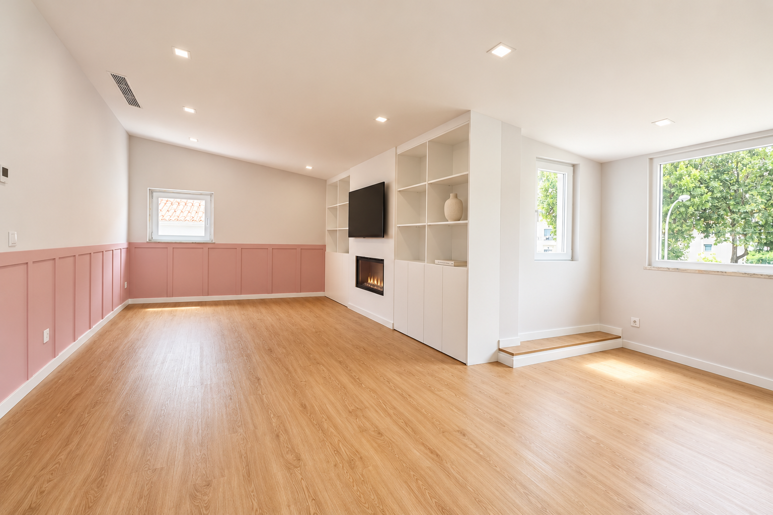 Bright living room with a fireplace in Queijas
